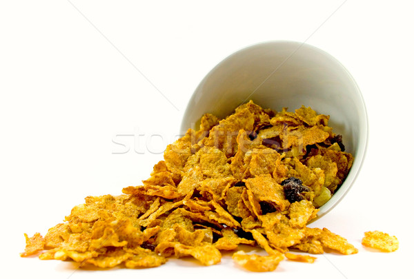 Cornflakes kom geïsoleerd witte voedsel achtergrond Stockfoto © marylooo