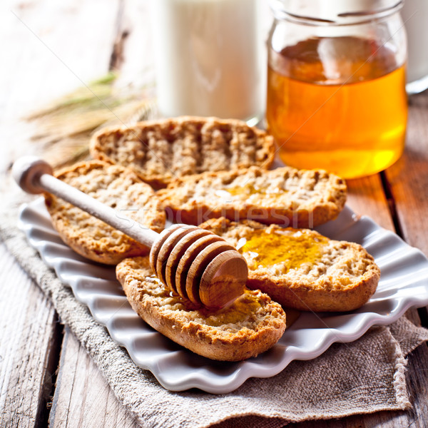 crackers, milk and honey  Stock photo © marylooo