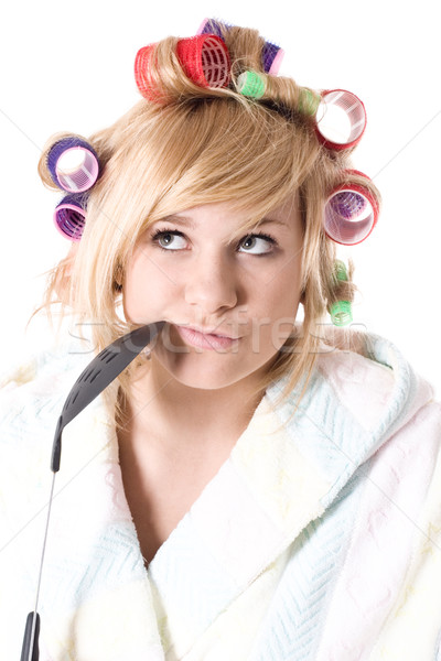 Stock photo: funny housewife with curlers