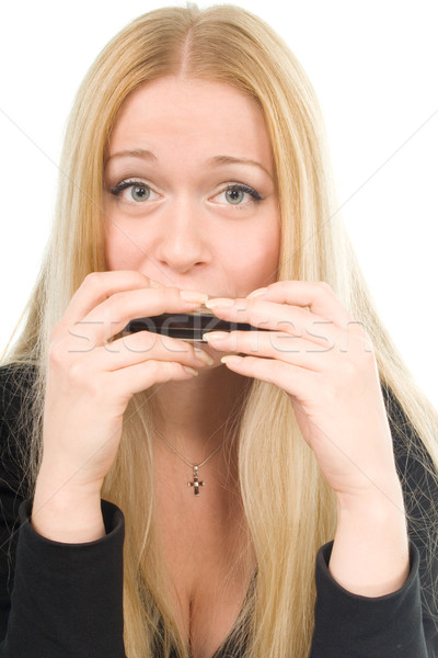 beautiful blond woman with a harmonica Stock photo © marylooo