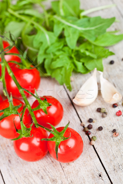 fresh tomatoes, rucola, garlic and peppercorns Stock photo © marylooo