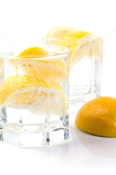 Foto stock: Sosa · agua · limón · rebanadas · dos · gafas