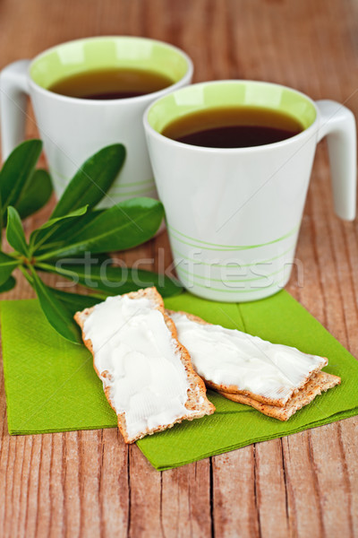 two cups of tea and crackers with cream cheese  Stock photo © marylooo