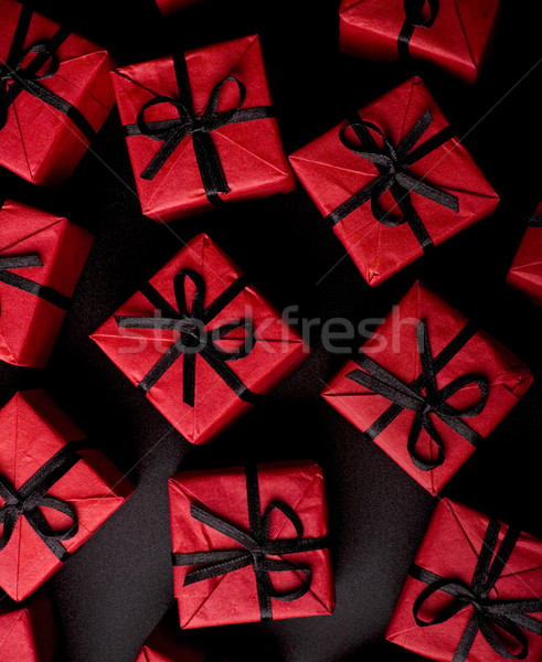 red gift boxes on black Stock photo © marylooo