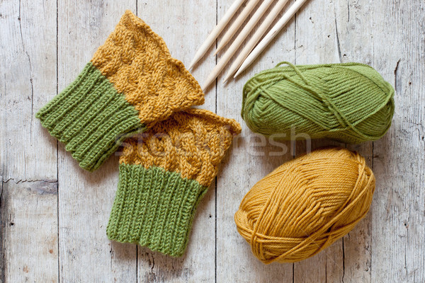 wool green and yellow legwarmers, knitting needles and yarn  Stock photo © marylooo