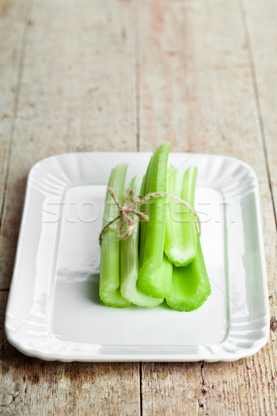 fresh green celery stems in plate Stock photo © marylooo