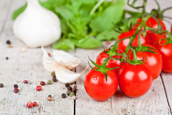 fresh tomatoes, rucola, garlic and peppercorns  Stock photo © marylooo