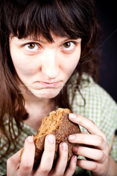Koldus darab kenyér portré szegény nő Stock fotó © marylooo