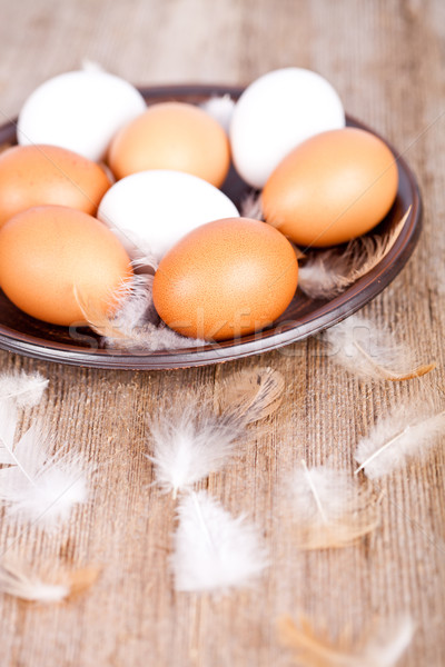 Stockfoto: Eieren · veren · plaat · rustiek · houten · tafel · Pasen