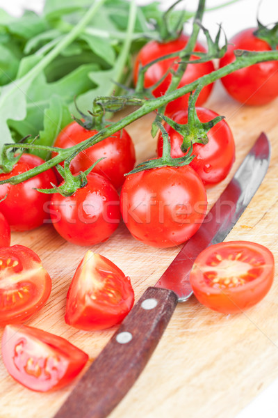 fresh tomatoes, rucola and old knife Stock photo © marylooo