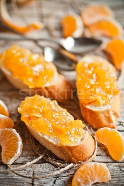 pieces of baguette with orange marmalade Stock photo © marylooo