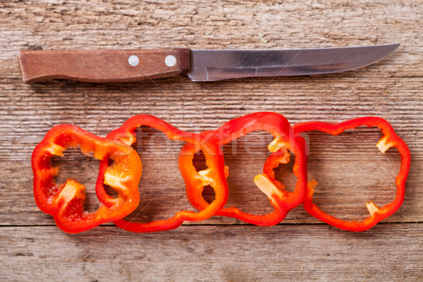 Szeletel piros harang paprikák öreg kés Stock fotó © marylooo
