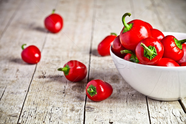 Vermelho quente pimentas tigela rústico Foto stock © marylooo