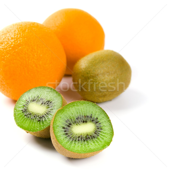 Stock photo: oranges and kiwi 