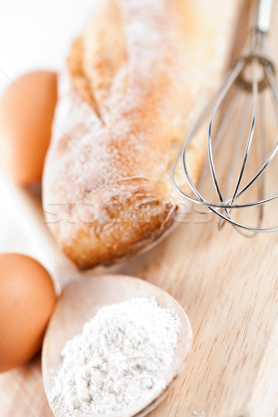 Stock photo: bread, flour, eggs and kitchen utensil 