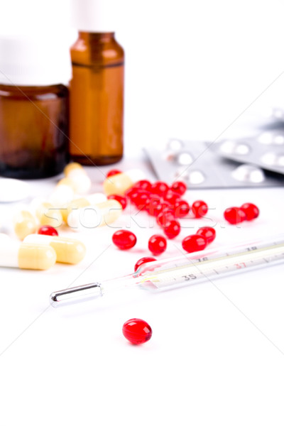 thermometer and pills Stock photo © marylooo