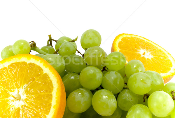 grapes and two halves of orange Stock photo © marylooo