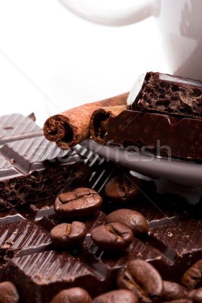 chocolate, coffee beans, cinnamon sticks and cup closeup Stock photo © marylooo