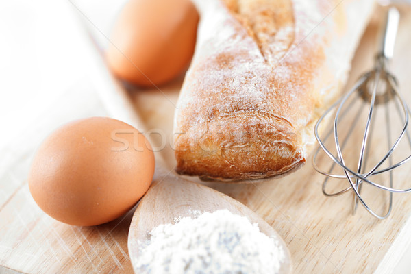 Kenyér liszt tojások konyhai eszköz csendélet fa deszka Stock fotó © marylooo
