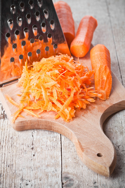 Stock photo: metal grater and carrot 