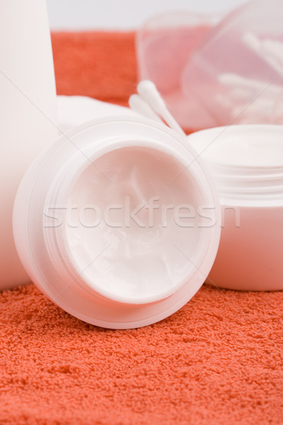 Stock photo: cream and cotton pads