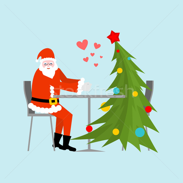 Santa Claus and Christmas tree in cafe. Christmas dinner. Old ma Stock photo © MaryValery