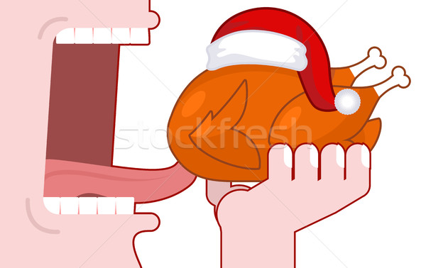 Eat Christmas turkey in Santa cap. Open mouth to make festive ch Stock photo © MaryValery