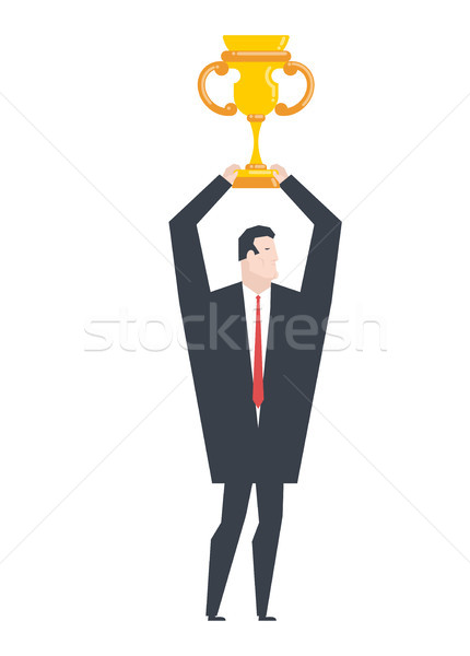 Business winner. businessman holds gold cup in his hands. Award  Stock photo © MaryValery