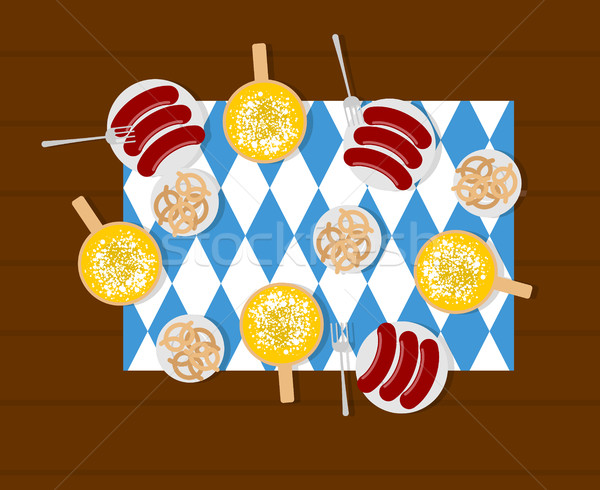 Oktoberfest food. Beer and sausages. Pretzels in plate. Meal for Stock photo © MaryValery