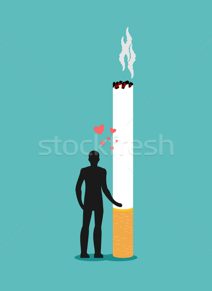 Lover smoke. Man hugging cigarette. Dependence on nicotine. Man  Stock photo © MaryValery