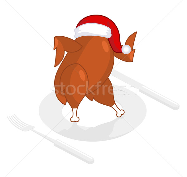 Christmas turkey in Santa Claus cap. Roast fowl on plate. Fried  Stock photo © MaryValery