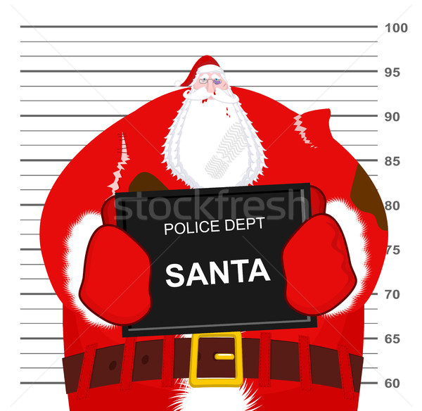 Santa Claus beaten at police department. Christmas fight. Bad Sa Stock photo © MaryValery