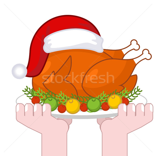 Christmas turkey in Santa Claus cap. Roast fowl on plate with ve Stock photo © MaryValery