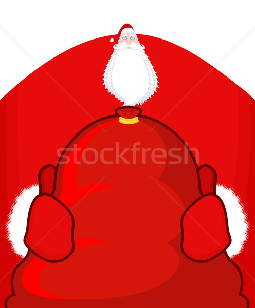 Stock photo: Santa Claus and red sack. Big bag with gifts. Giving gifts at Ch