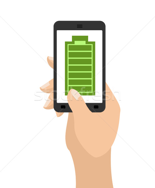 Full charge of smartphone battery. Green accumulator. Hand hold  Stock photo © MaryValery