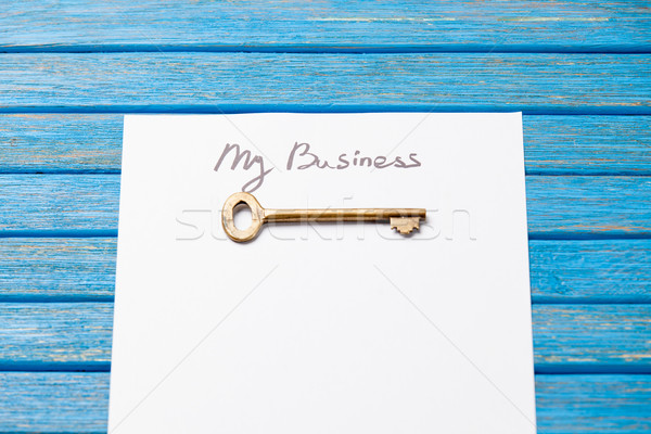 photo of paper My business and golden key on the wonderful blue  Stock photo © Massonforstock