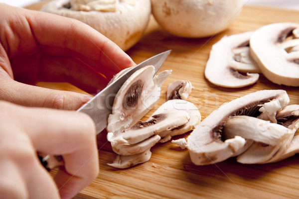 Mushrooms cutting Stock photo © Massonforstock