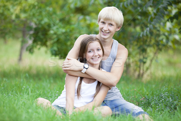 Jovem adolescente casal verde parque primavera Foto stock © Massonforstock