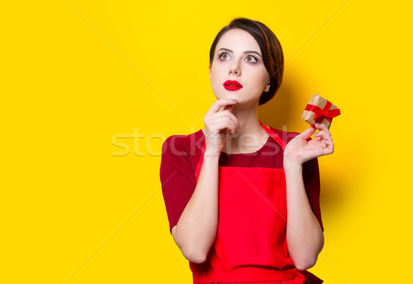 young housewife with gift  Stock photo © Massonforstock