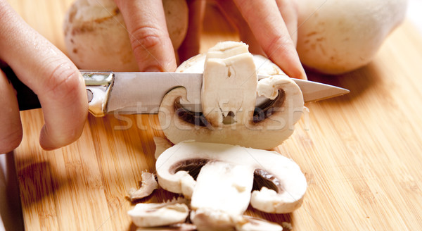 Mushrooms cutting Stock photo © Massonforstock