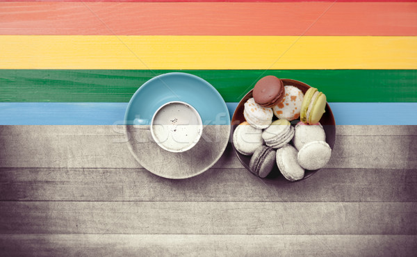 photo of cup of coffee and plate full of macaroons on the wonder Stock photo © Massonforstock