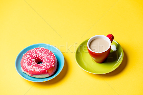 tasty glazed donut and cup of coffee on plates on the wonderful  Stock photo © Massonforstock