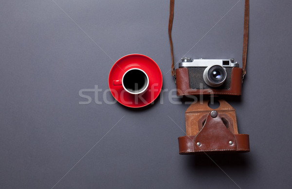 cup of coffee and retro camera Stock photo © Massonforstock