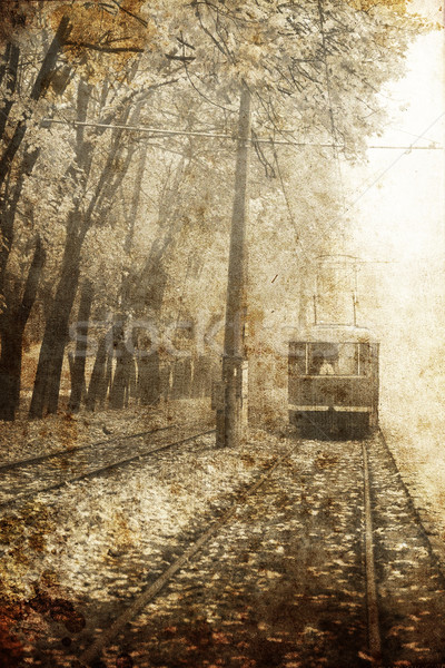 Tramway near autumn alley in Odessa, Ukraine. Photo in old image Stock photo © Massonforstock