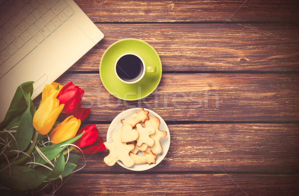 Taza café cookies cuaderno tulipanes Foto stock © Massonforstock