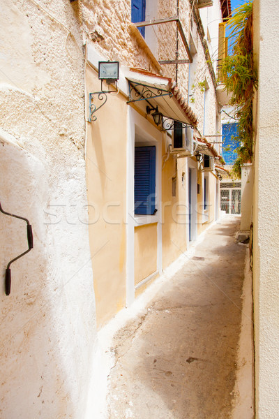 photo of one of cozy and little streets full plants in sunny and Stock photo © Massonforstock