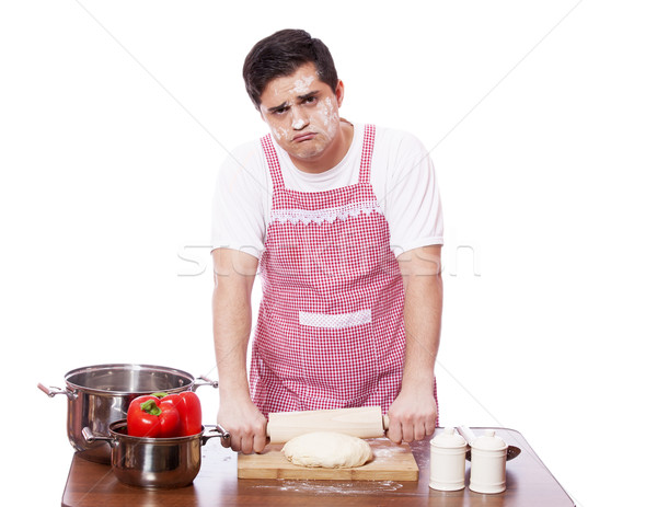 Sad man try to cooking. Stock photo © Massonforstock