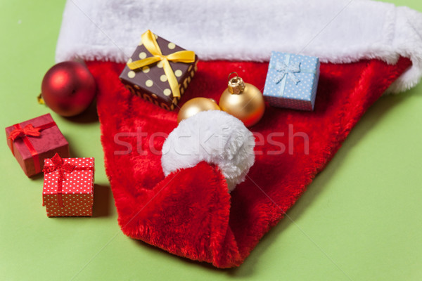 Noel baba şapka Noel hediyeler yeşil kırmızı Stok fotoğraf © Massonforstock