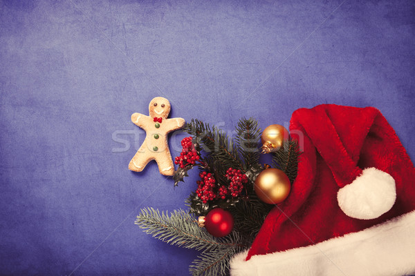 Gingerbread man and Christmas gifts Stock photo © Massonforstock