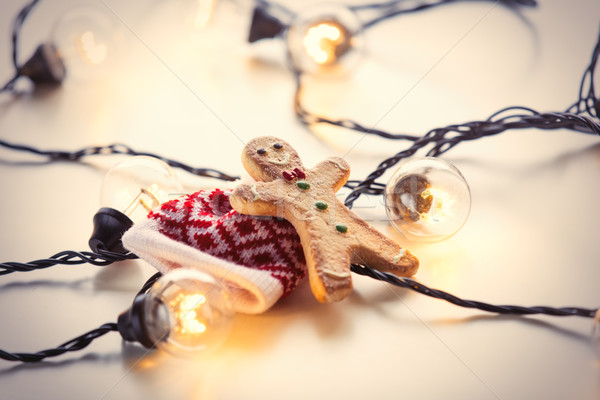 Fairy lights and gingerbread cookie Stock photo © Massonforstock